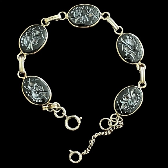 Vintage Jewelry - Imitation hematite carved Roman soldier silver tone adjustable bangle bracelet